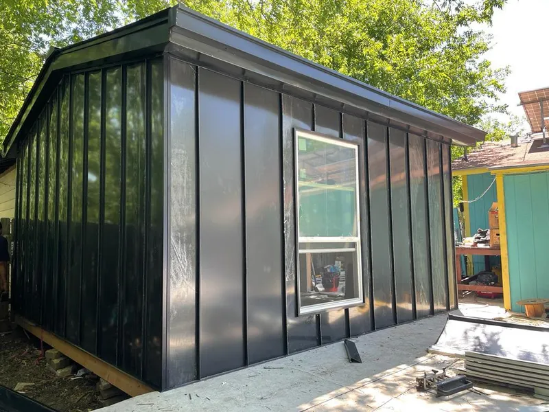 Black standing seam metal wall panels for Metal Roof Installation in Henryetta